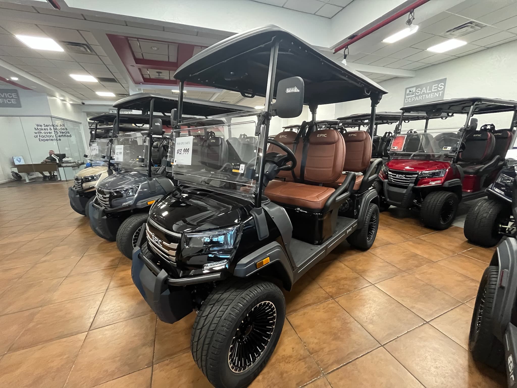 Rows of EPIC carts lined up inside the Pinellas Park showroom