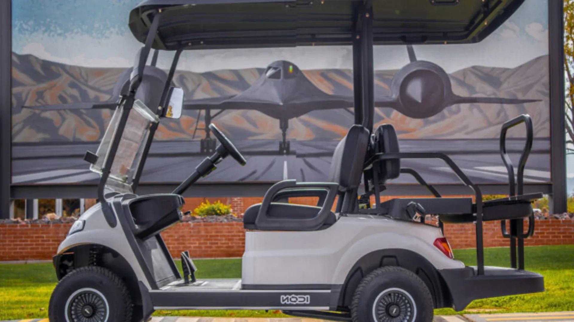 White ICON i40X four-passenger LSV golf cart, side profile